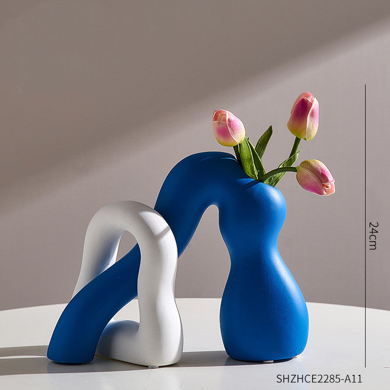 Abstract Character Art Vase Flower Arrangement And Dried Flower Creative TV Cabinet